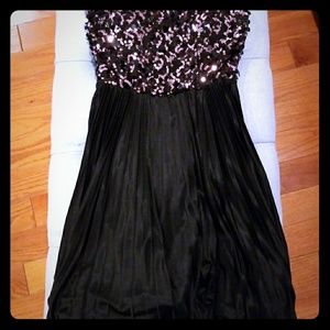 Sequined top and pleated black NYE dress